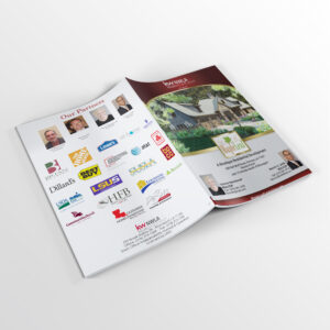 a photograph of the bi fold brochure created for the ground breaking ceremony of the maple leaf subdivision