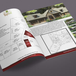 a photograph of the bi fold brochure created for the ground breaking ceremony of the maple leaf subdivision